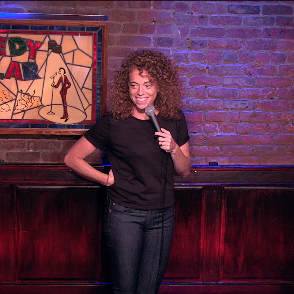 Comedian Michelle Wolf onstage at the Comedy Cellar.
