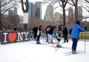 People on skis in Central Park.